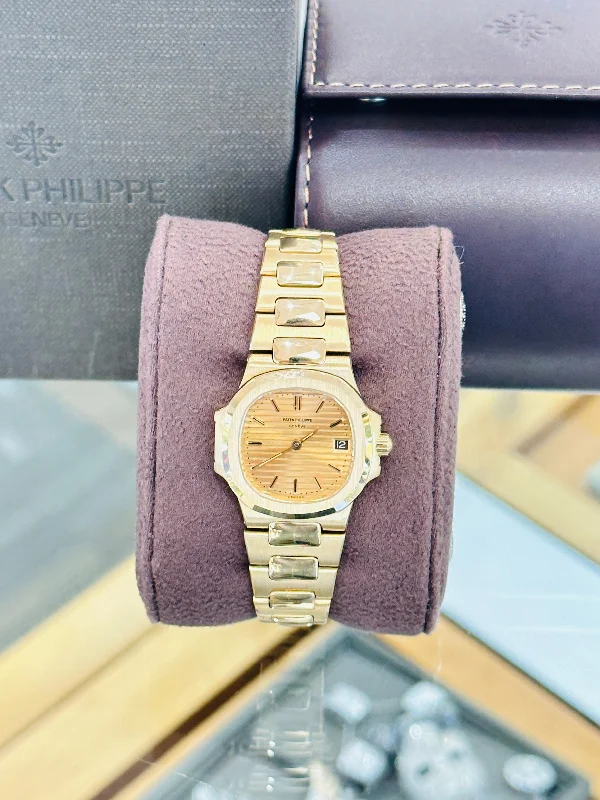 Patek Philippe Nautilus 4700/1J 18k Yellow Gold Champagne Dial Women's Watch